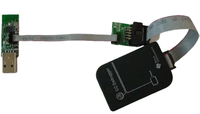 Conectar debugger, adaptador y dongle Conexión completa del material